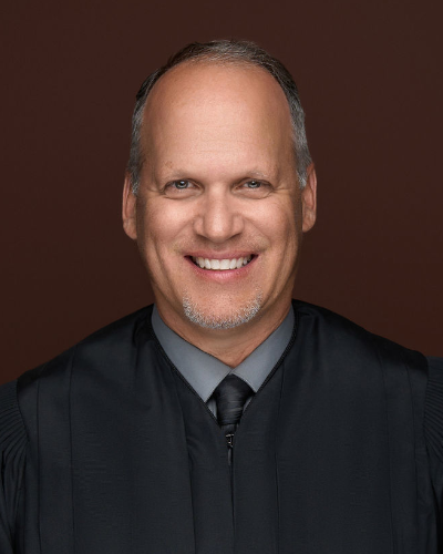 Justice Jon West